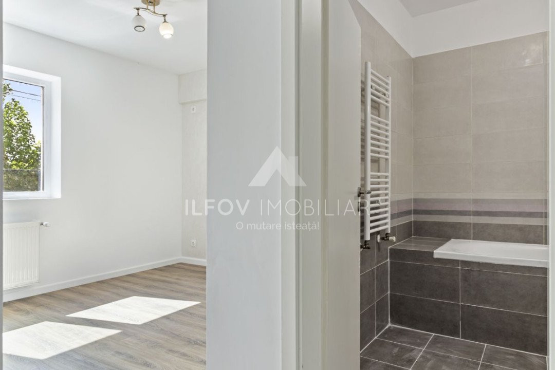 Apartament 3 camere 74.76mp curte 46mp 2 bai Otopeni parcul Unirii